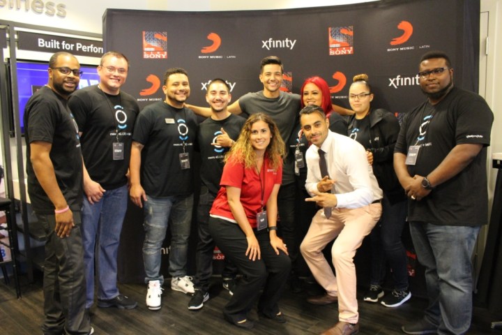 Luis Coronel with employees of the Xfinity Store in San Jose